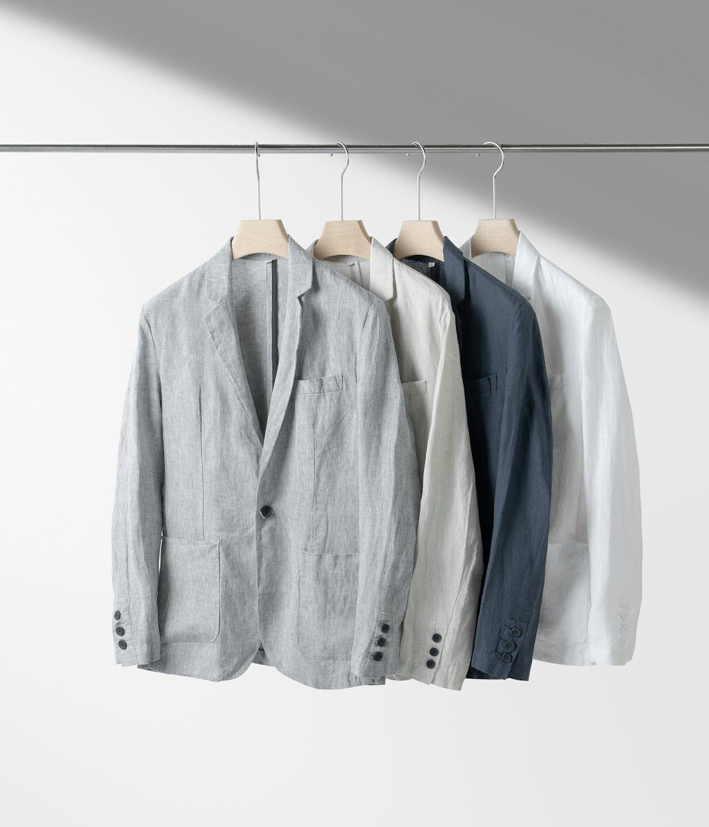 A row of shirts hanging on a clothes line
